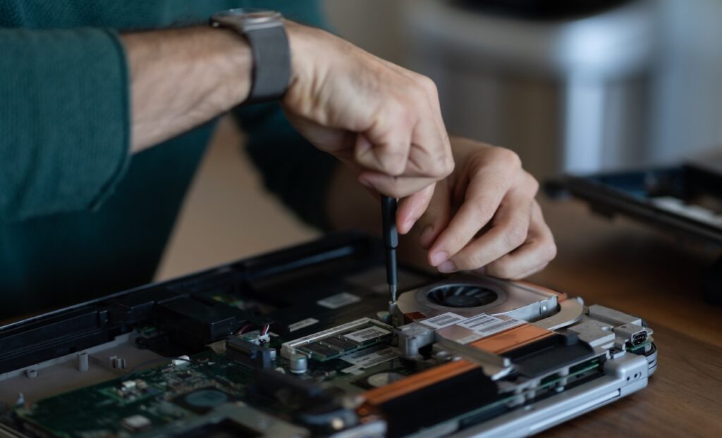 Man fixing computer